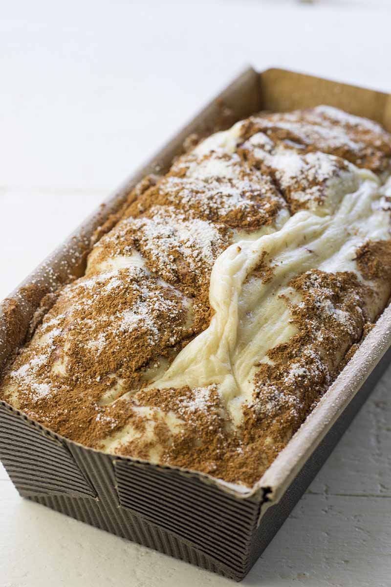 Cinnamon swirl cake in a paper loaf pan