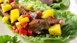Slow Cooker Chili Lime Beef Tacos With Mango Salsa - Who said tacos need a corn tortilla taco shell, cheese, and a bunch of junk anyway? These beef tacos are healthy and delicious│TheFitBlog.com