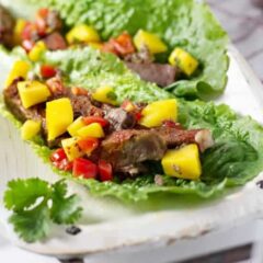 Slow Cooker Chili Lime Beef Tacos With Mango Salsa - Who said tacos need a corn tortilla taco shell, cheese, and a bunch of junk anyway? These beef tacos are healthy and delicious│TheFitBlog.com