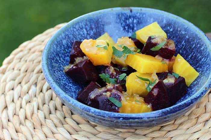 Roasted Beets with Orange Vinaigrette in a blue bowl