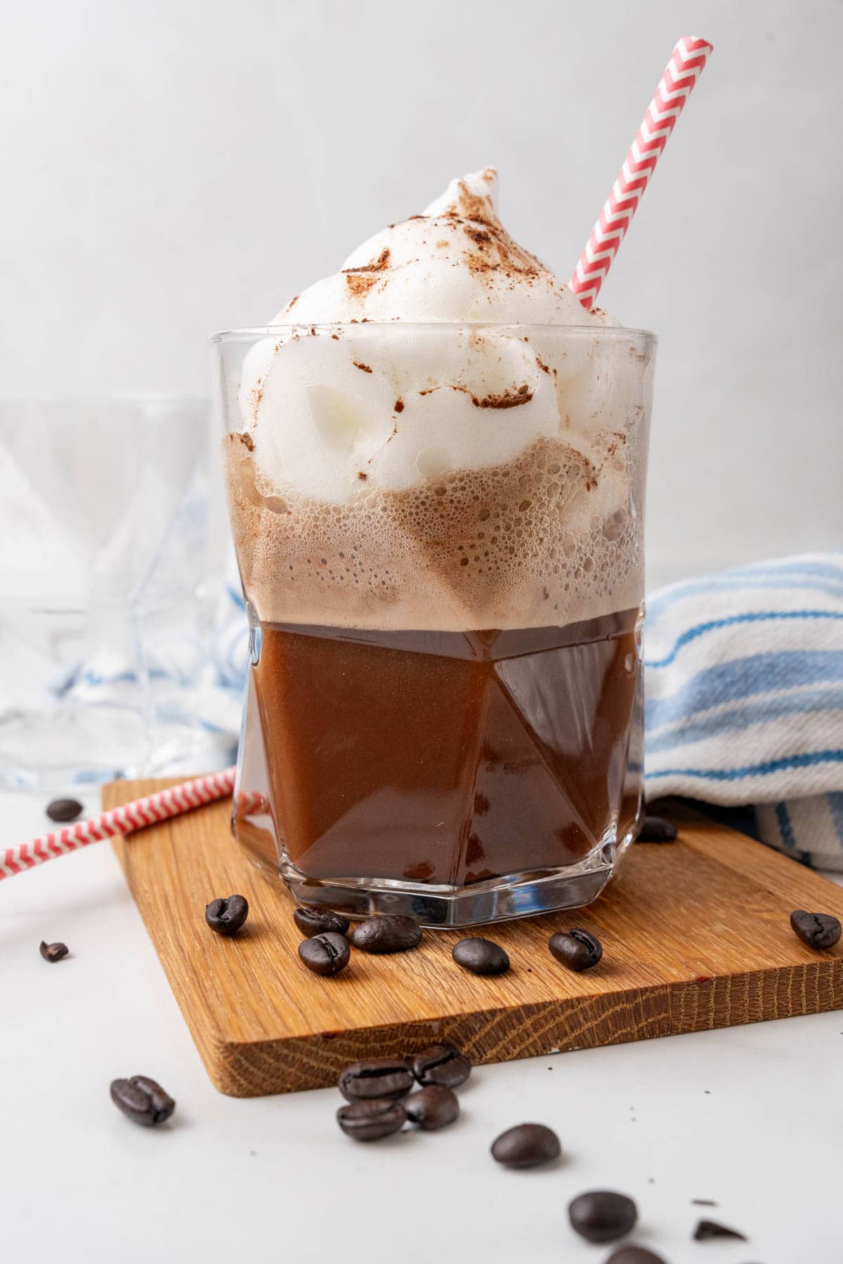 Glass of Low-Carb Chocolate Coffee Protein Shake with a straw