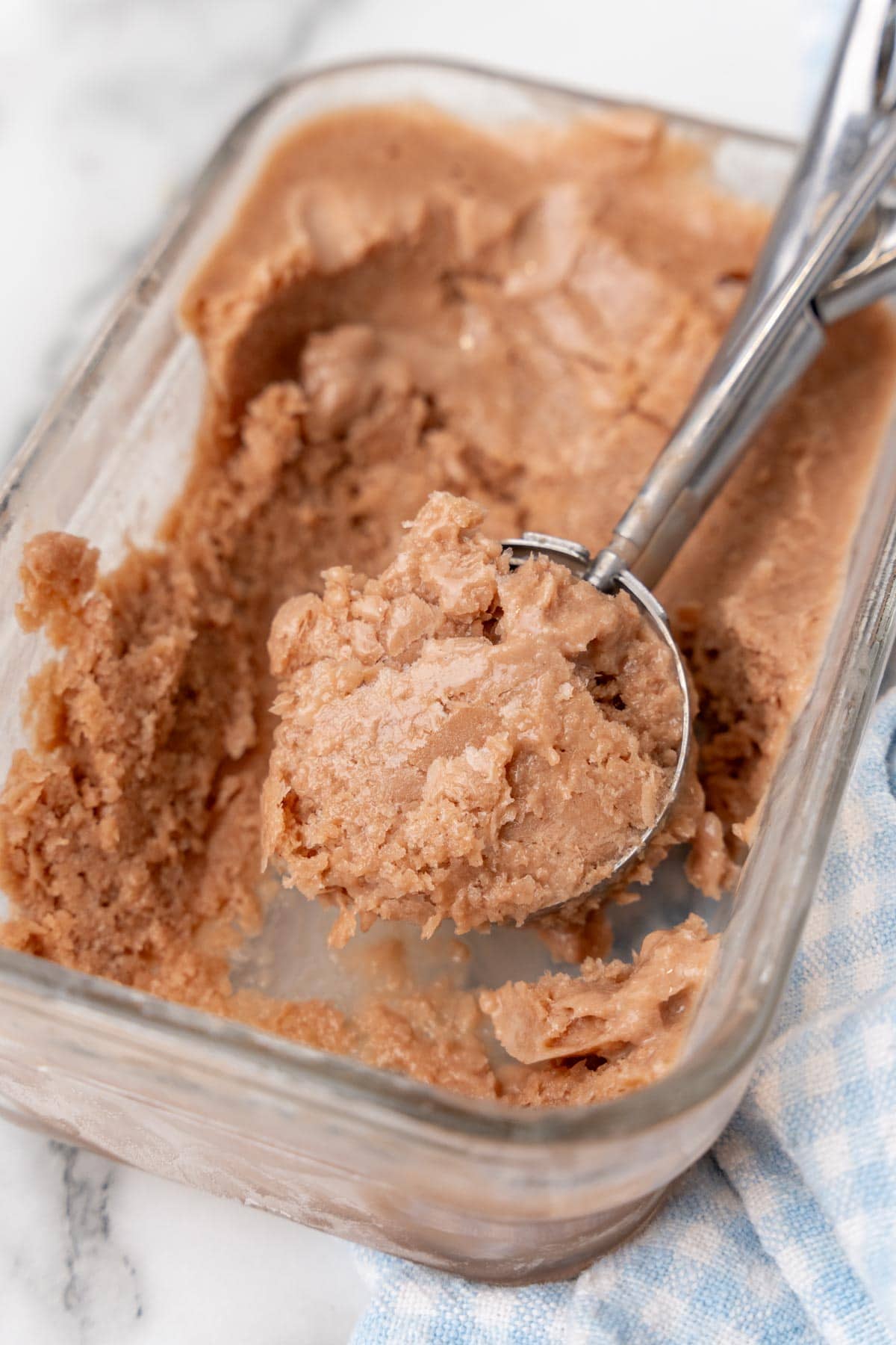 Scoop of chocolate Greek yogurt ice cream in a spoon