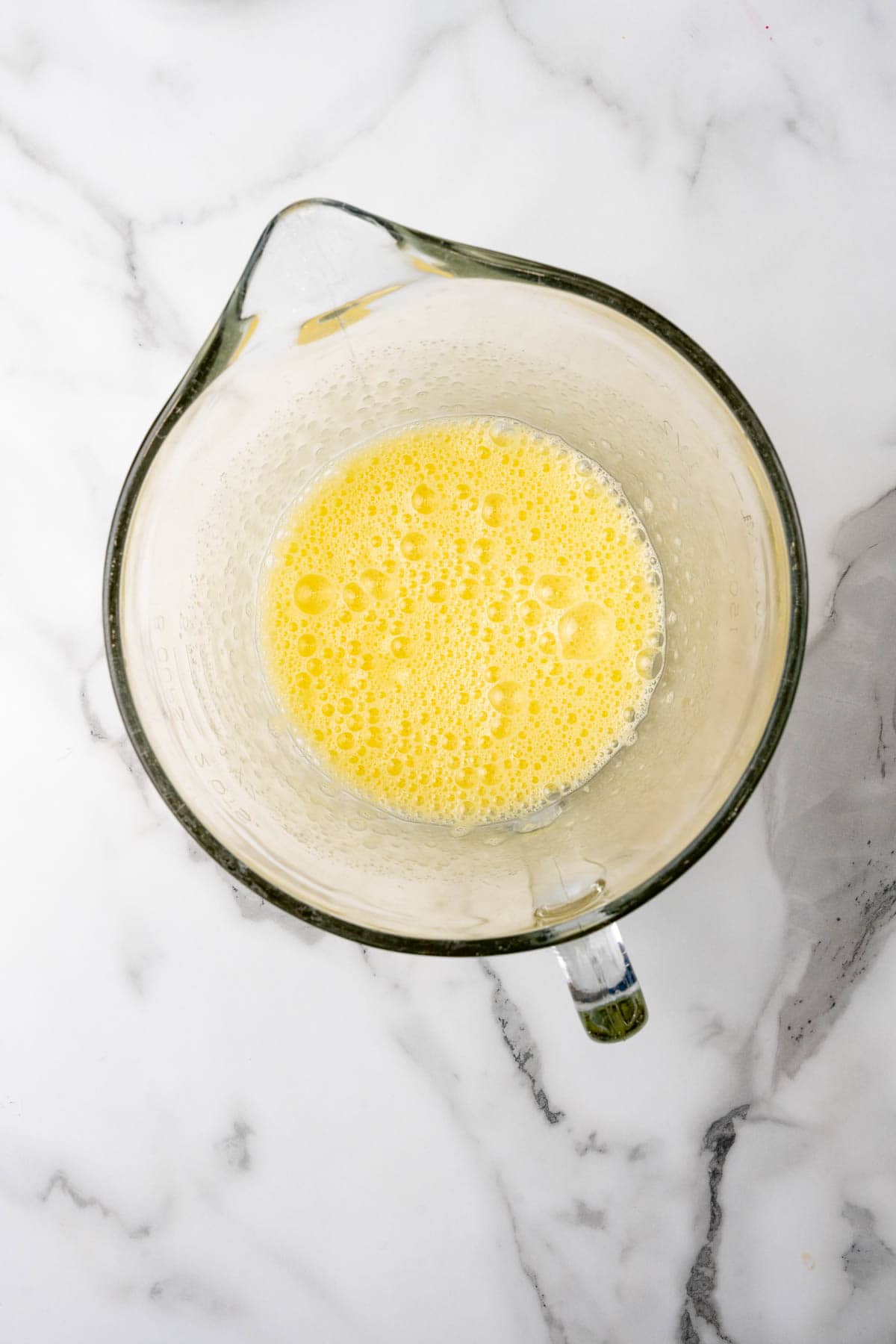 Eggs, sugar, and vanilla beaten in a stand mixer