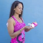 Woman eating glucose tabs
