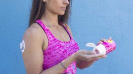Woman eating glucose tabs