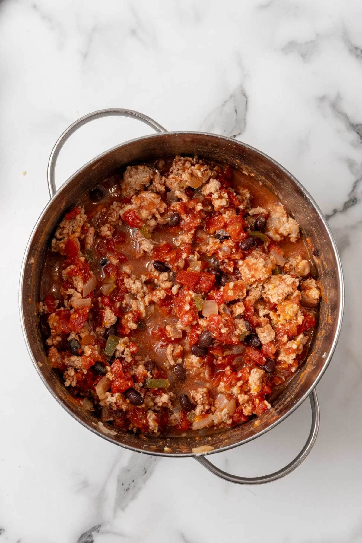 Finished turkey chili simmering in a pot