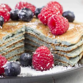 Stack of protein pancakes with berries