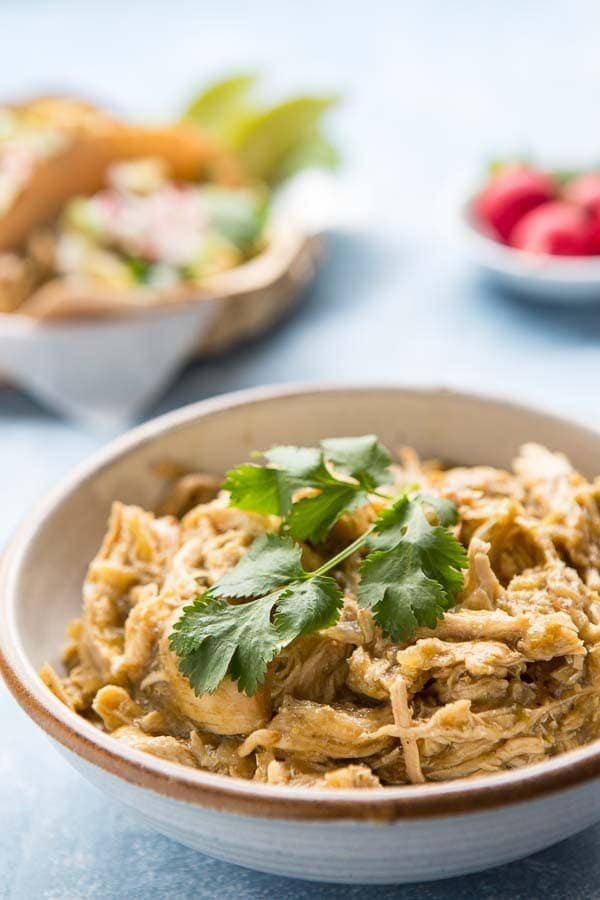 Bowl of Instant Pot Chicken Chili with cilantro on top
