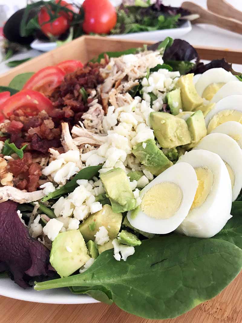 Closeup of fully prepared salad on a plate