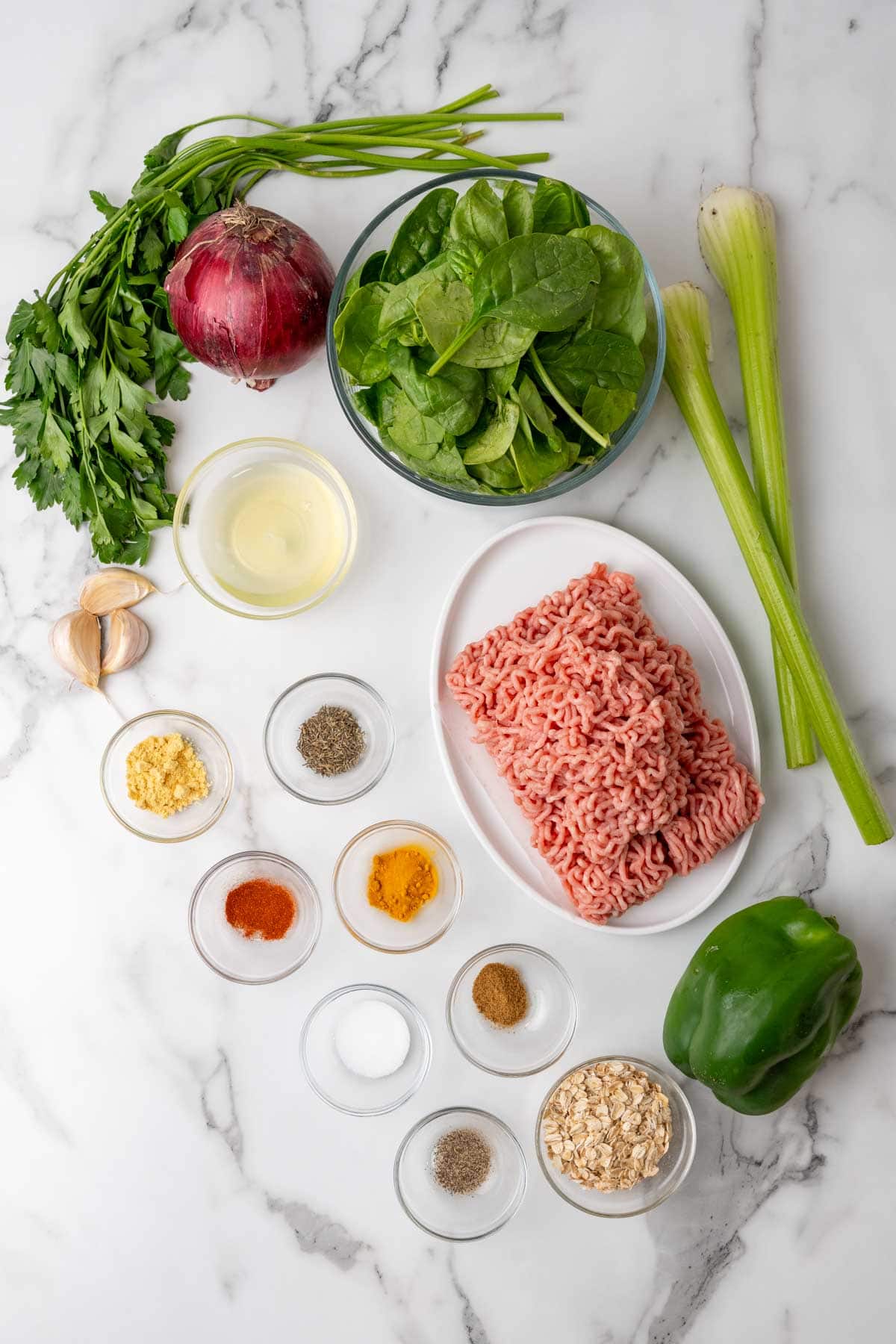 Ingredients for the turkey meatballs laid out on a table