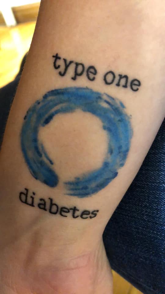 Blue circle diabetes tattoo
