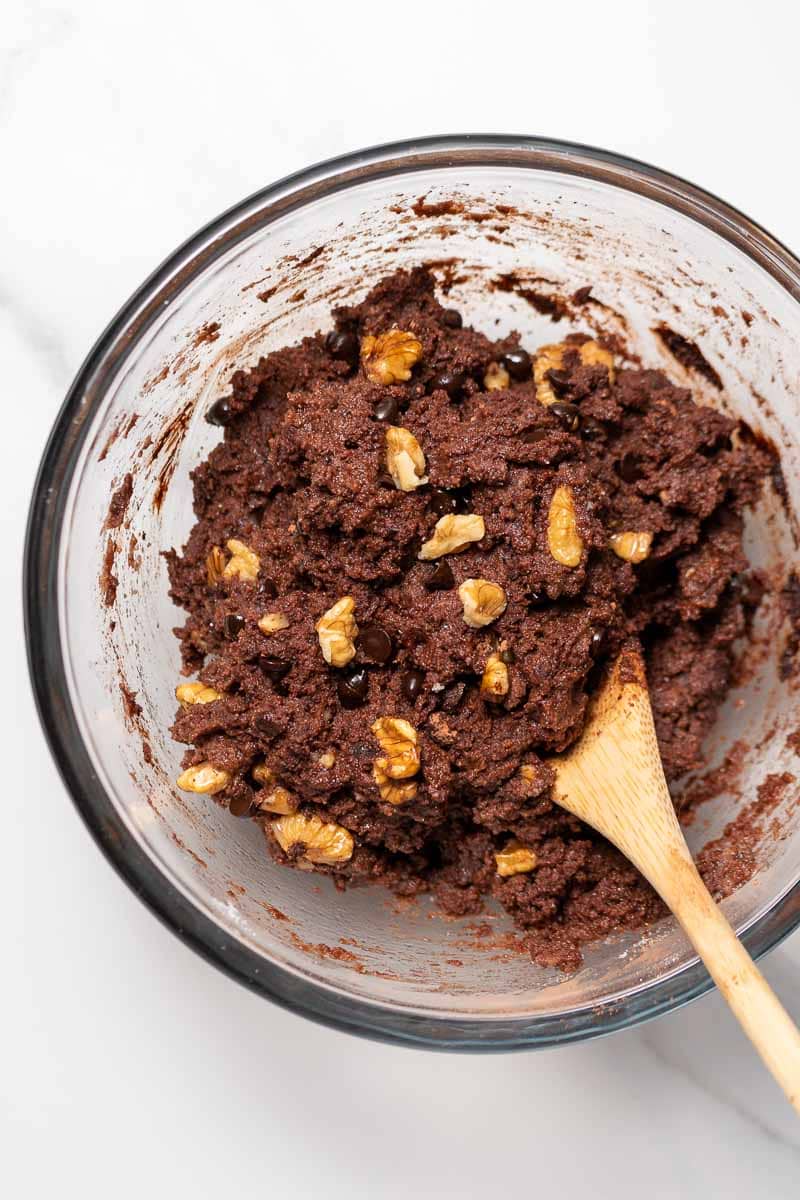 All brownie ingredients combined in a mixing bowl