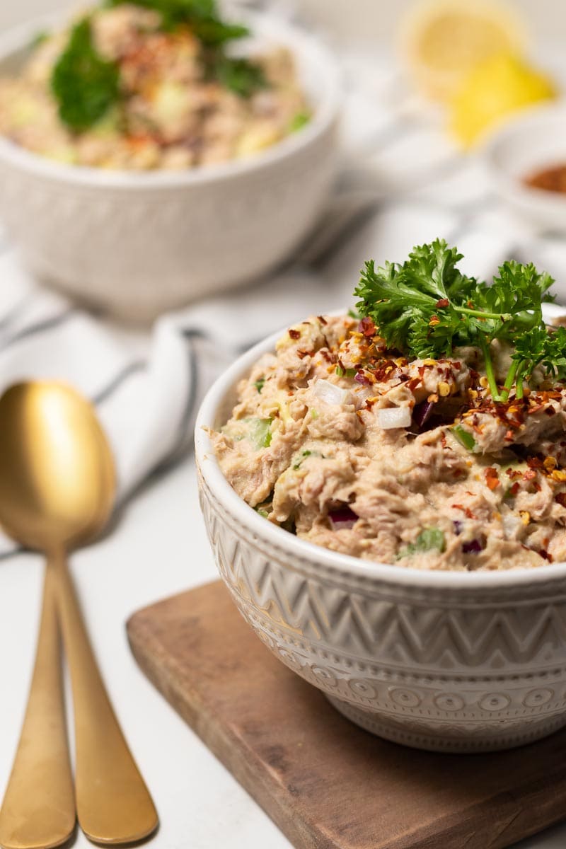 Close up shot of the tuna salad garnished with parsley