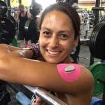 Christel at gym with Skin Grip on arm
