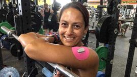 Christel at gym with Skin Grip on arm