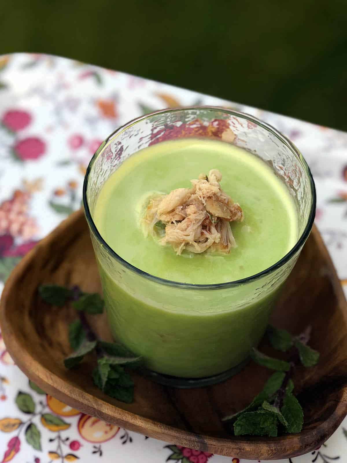 Cold Pea Soup with Crab and Mint in  a glass