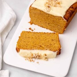 Loaf of pumpkin bread with slice