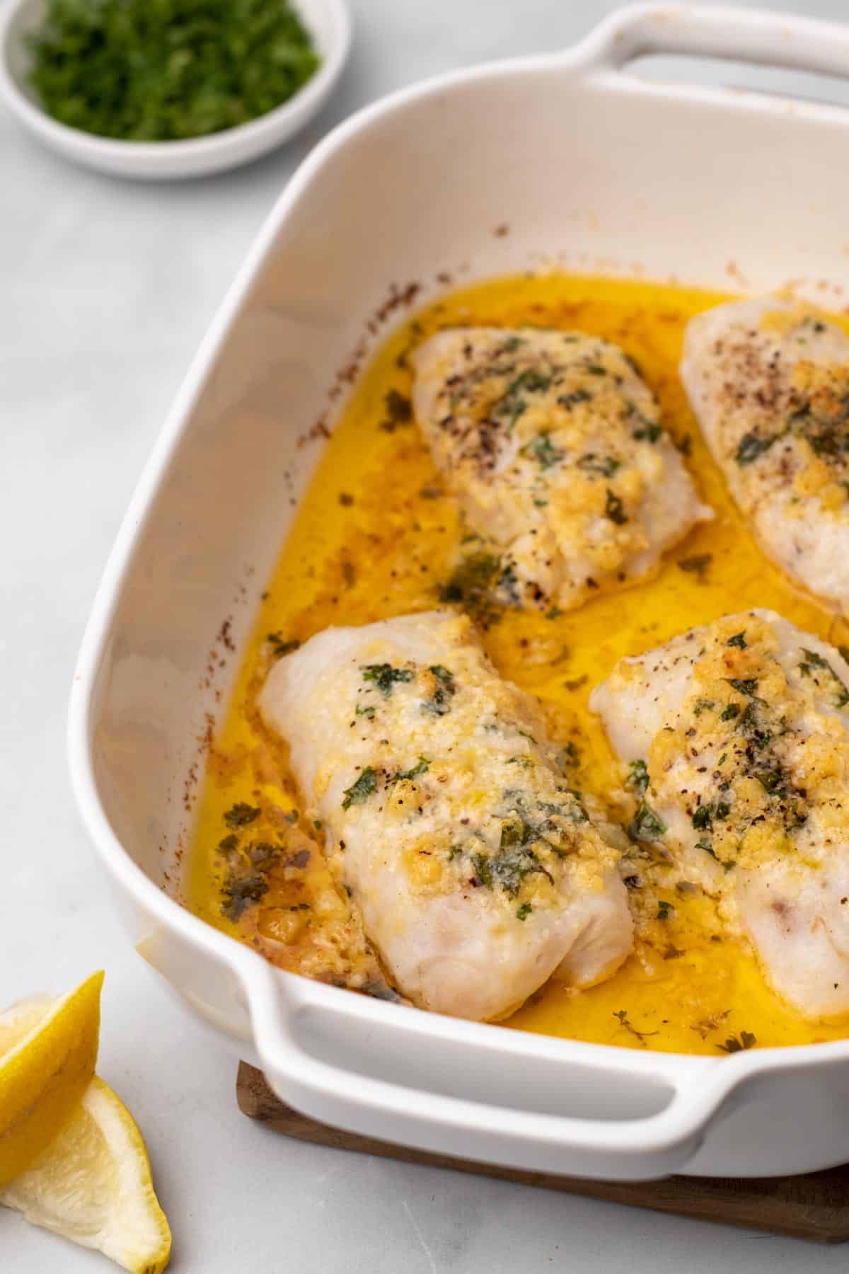 Close-up of cod filets in the baking dish