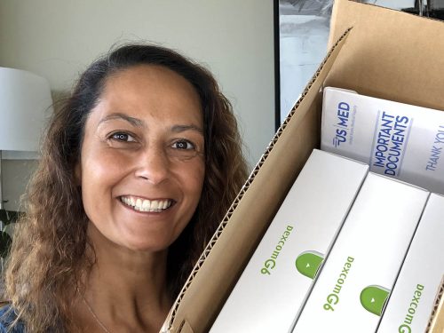 Christel holding box of diabetes products from US MED