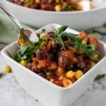 Spicy black beans with tomatoes and corn