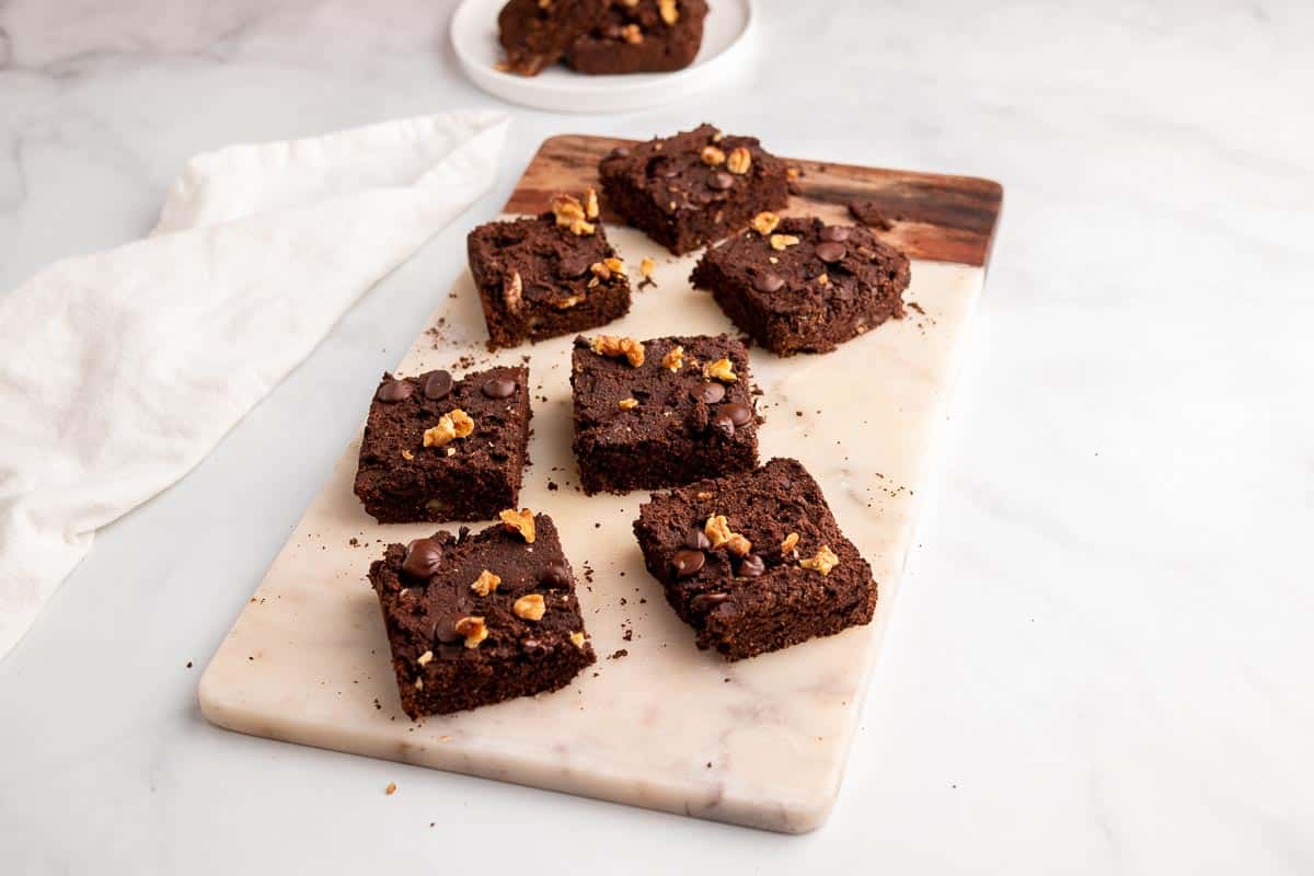 Brownie squares on a decorative cutting board