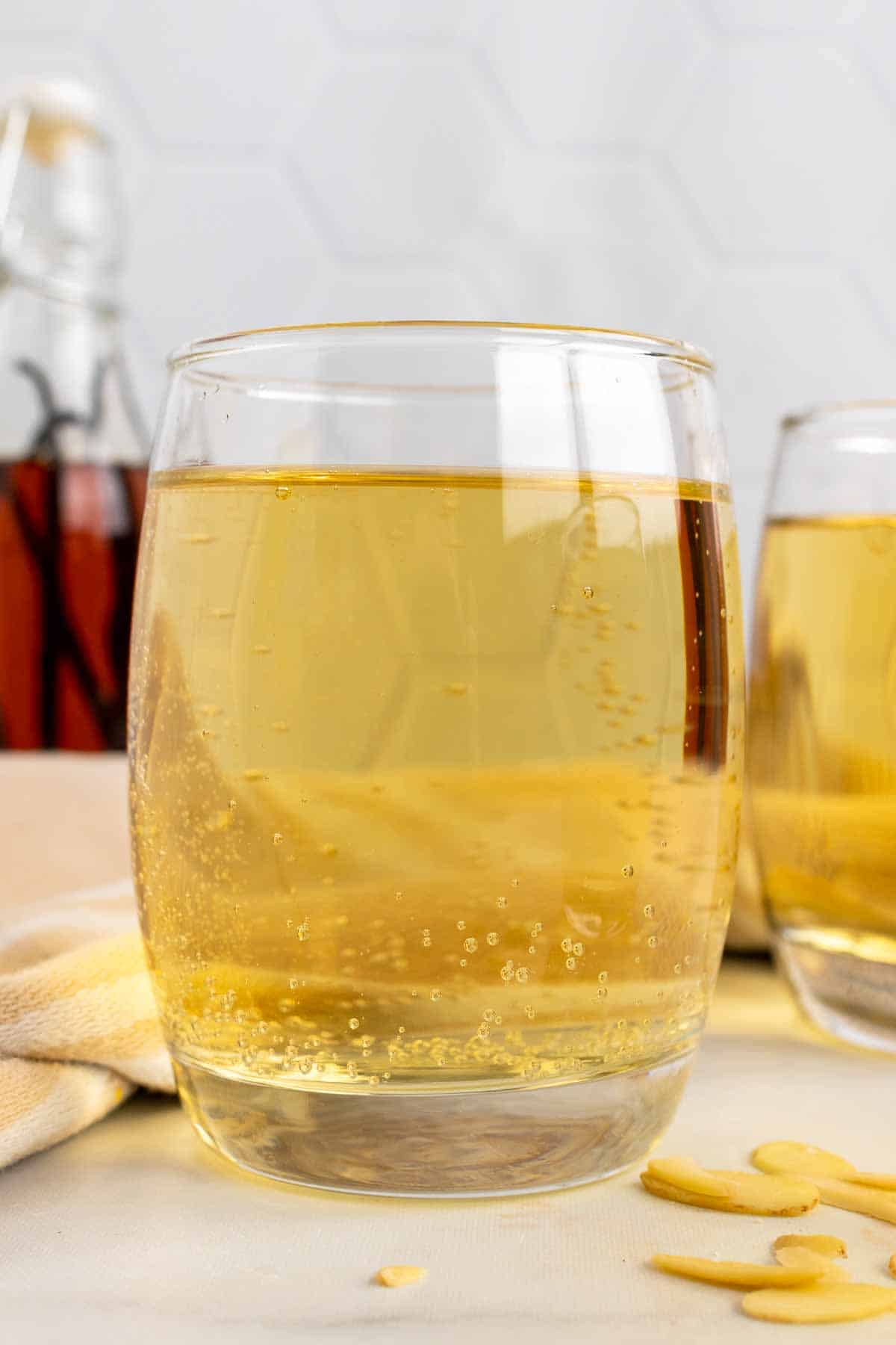 Glass of Apple Cider Vinegar Soda on table