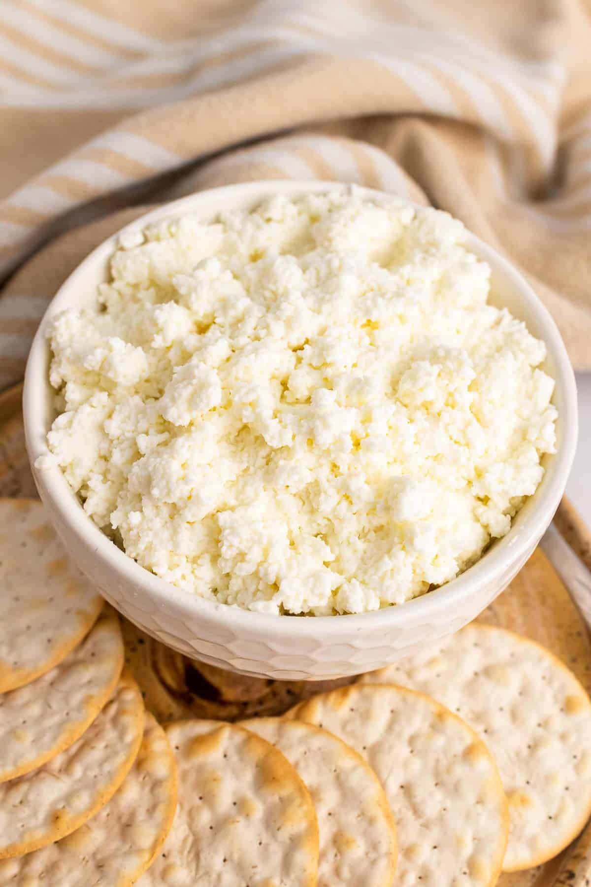 Bowl of ricotta cheese on tray