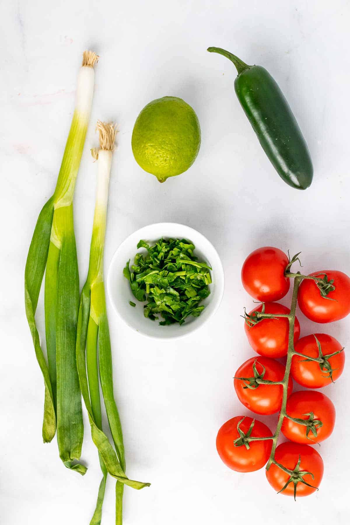 Salsa ingredients on a cutting board