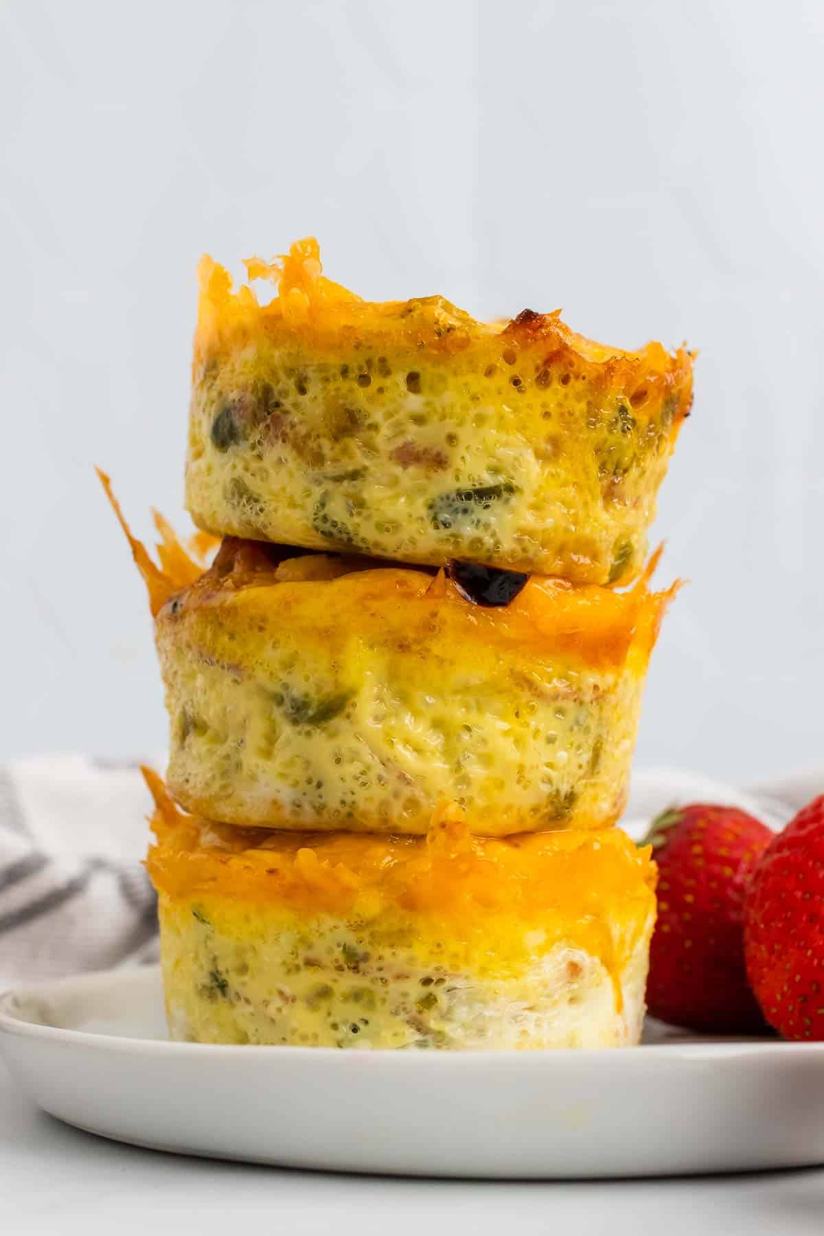 Stack of three egg muffins seen from the side