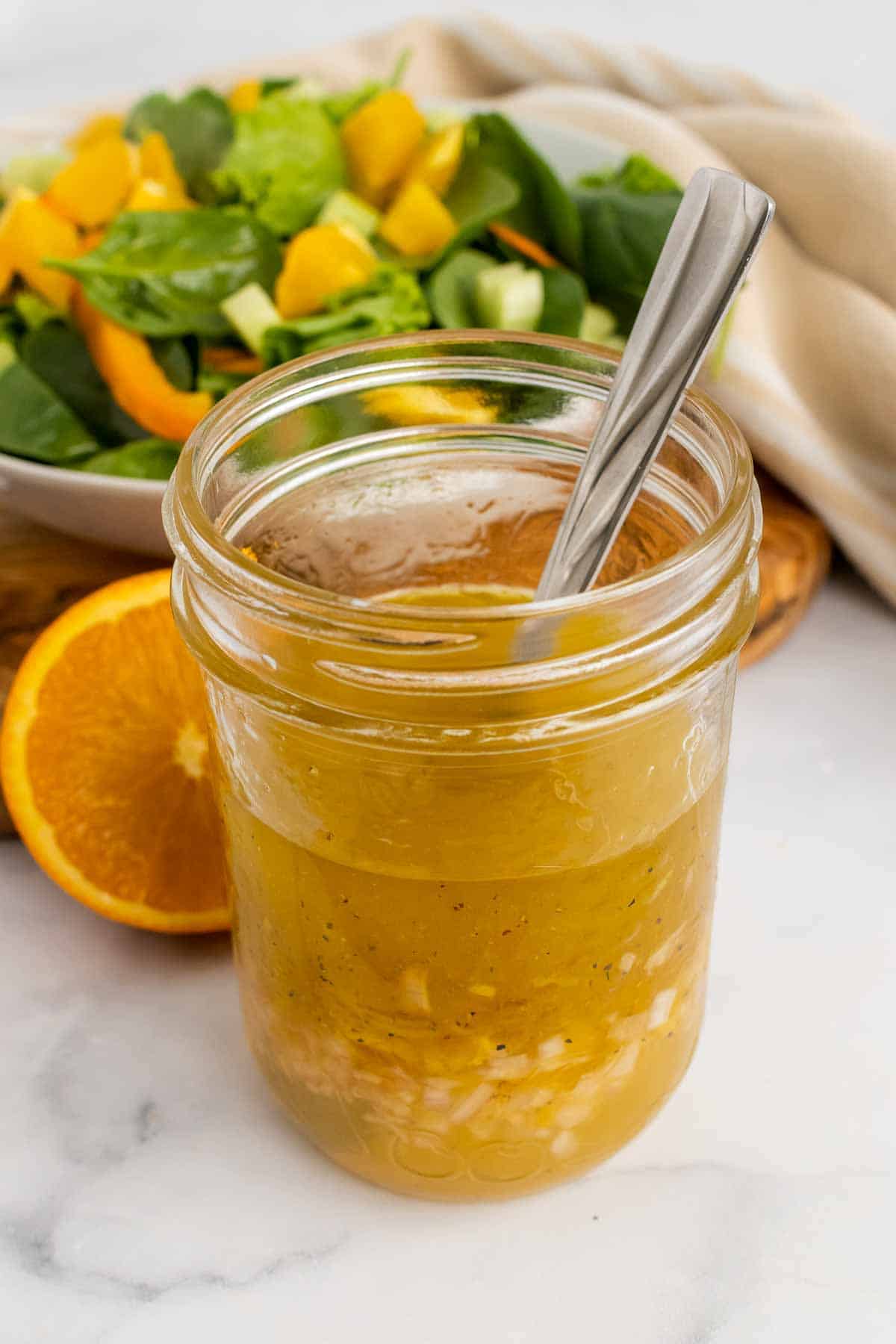 Glass jar with citrus vinaigrette