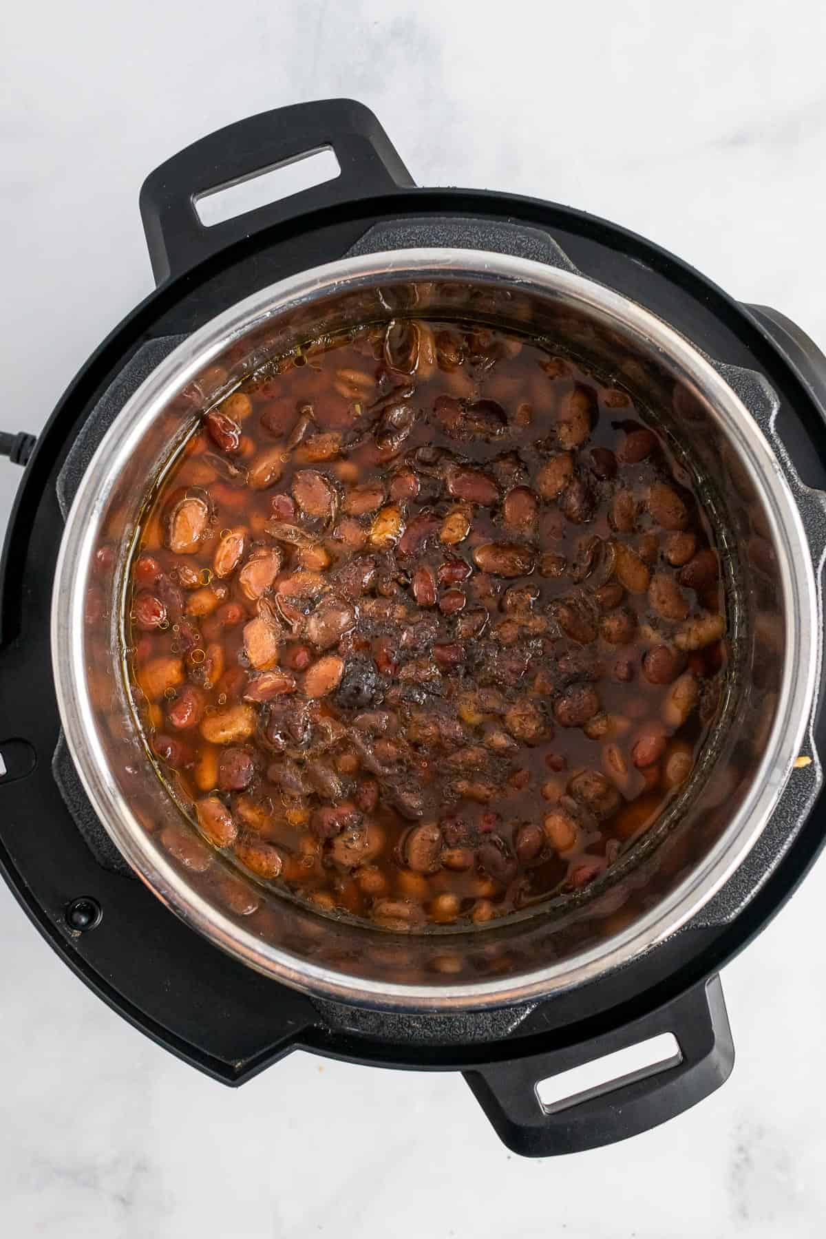 Cooked beans in the instant pot, seen from above
