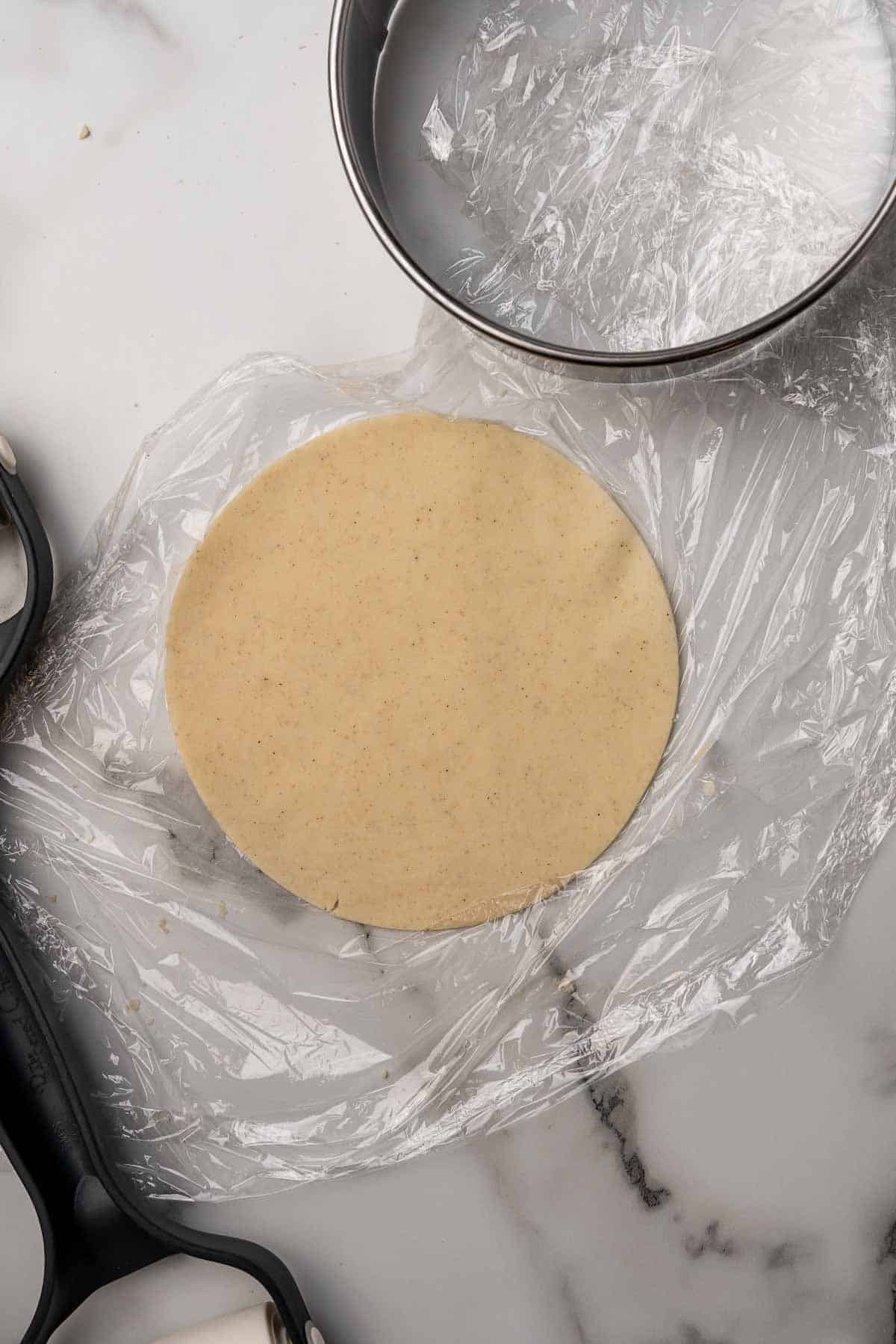 Dough pressed into an 8-inch tortilla