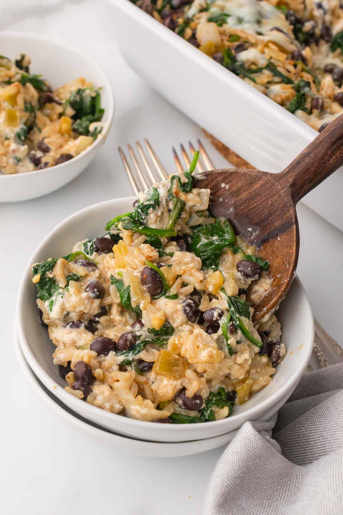 Bowl of Black Bean and Brown Rice Casserole with spoon