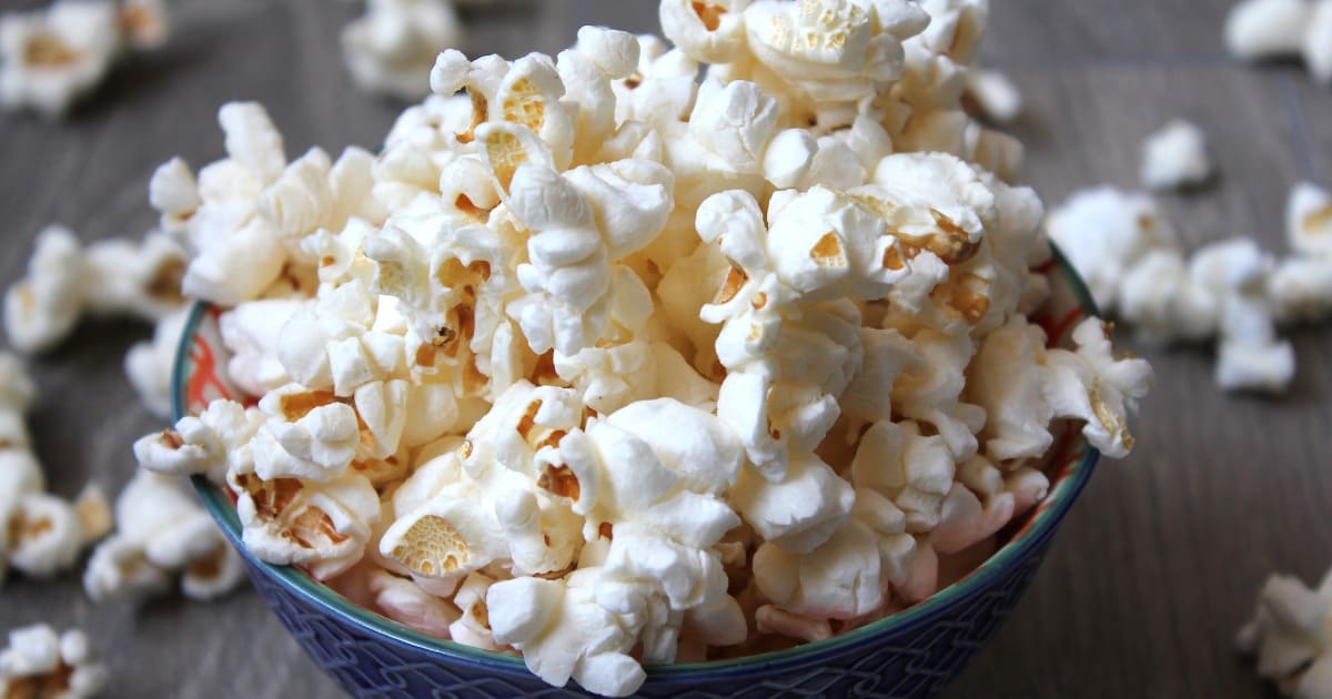 Bowl filled to the brim with popcorn