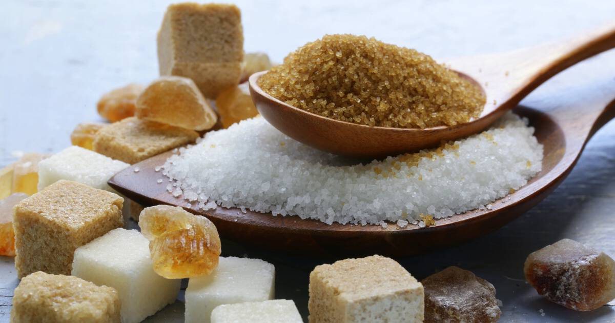 Close-up of different types of sugar piled on top of each other.