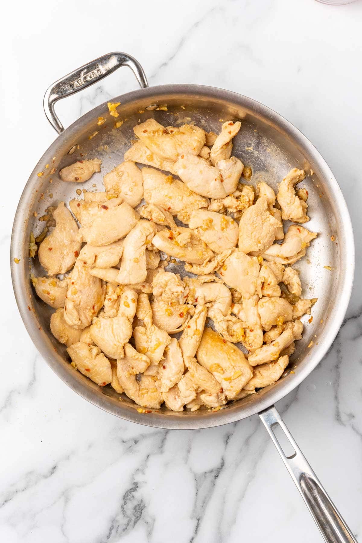 Fried chicken strips in a pan