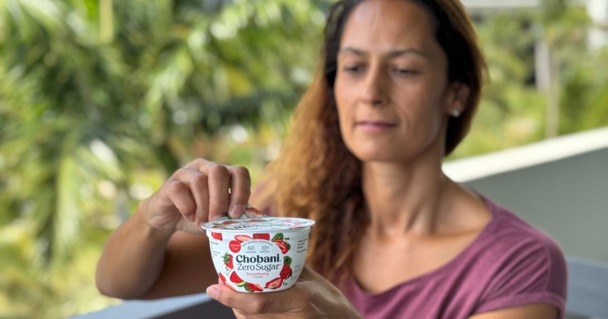Christel holding a low-carb yogurt