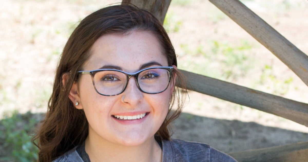 Faith Riddell-Harding smiling at the camera