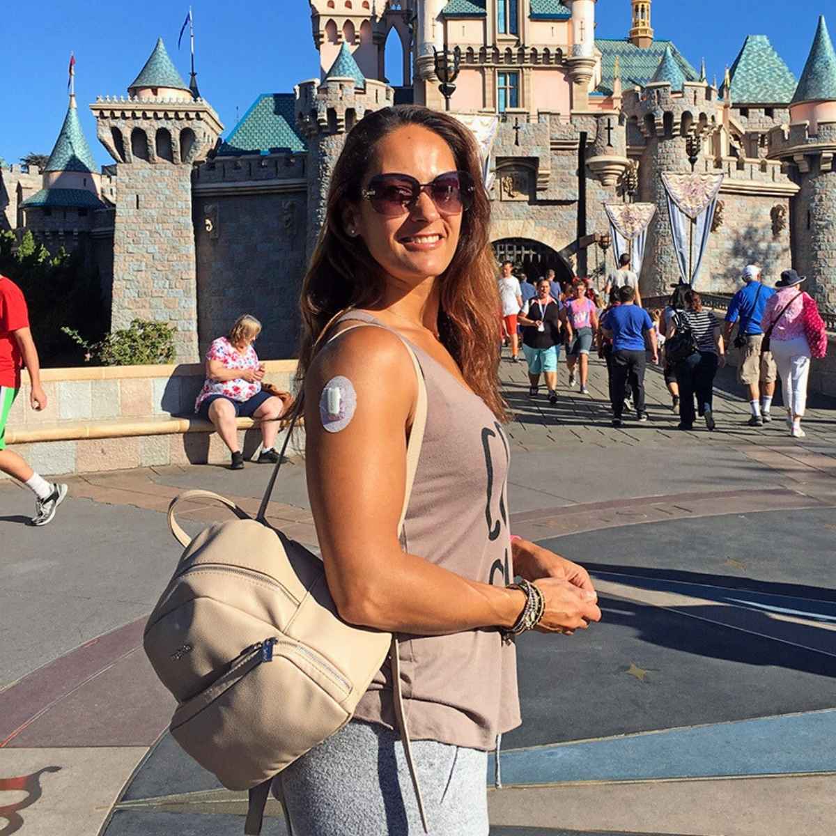 Woman carrying a bag containing diabetic supplies